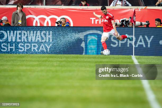 Lewis Morgan of New York Red Bulls takes the corner kick in the first half of the match against Columbus Crew at Red Bull Arena on March 20, 2022 in...
