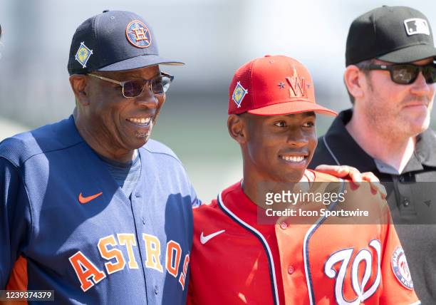 Houston Astros manager Dusty Baker poses with his son, Washington Nationals minor league player Darren Baker after exchanging lineups before an MLB...