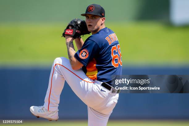 Houston Astros pitcher Hunter Brown throws the ball from the mound during an MLB spring training game between the Washington Nationals and the...