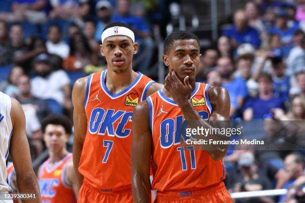 Darius Bazley of the Oklahoma City Thunder and Theo Maledon of the Oklahoma City Thunder looks on during the game against the Orlando Magic on March...