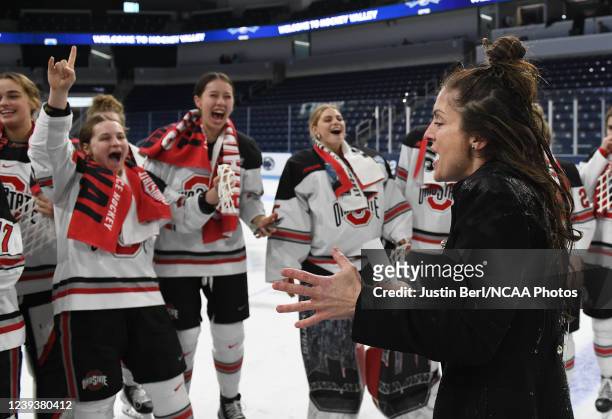Head Coach Nadine Muzerall of the Ohio State Buckeyes reacts after having water dumped on her after the Buckeyes defeated the Minnesota Duluth...