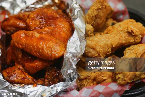 Original and extra spicy Korean fried chicken in Toronto, Ontario, Canada, on March 20, 2022.