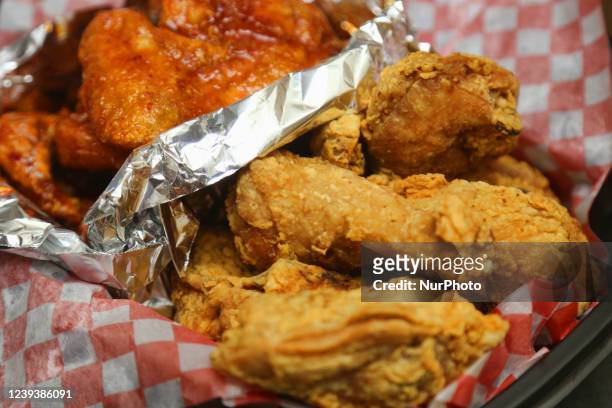 Original and extra spicy Korean fried chicken in Toronto, Ontario, Canada, on March 20, 2022.