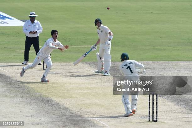 Pakistan's Naseem Shah tries to catch the ball played by Australia's Usman Khawaja during the first day of the third and final Test cricket match...