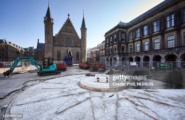 Picture shows fences closing off the Binnenhof to the public for renovation works in The Hague on March 21, 2022. - The Binnenhof, Netherland's...