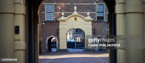 Picture shows fences closing off the Binnenhof to the public for renovation works in The Hague on March 21, 2022. - The Binnenhof, Netherland's...