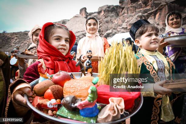 People celebrate Nowruz, considered as the harbinger of spring, awakening of nature and brotherhood, with traditional costumes and at Gobustan...