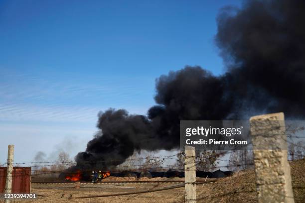 Kyiv, UKRAINE A ammunition depot and a fuel storage on a Ukrainian military base is hit by a missile on the outskirts of Kyiv on March 12, 2022 in...