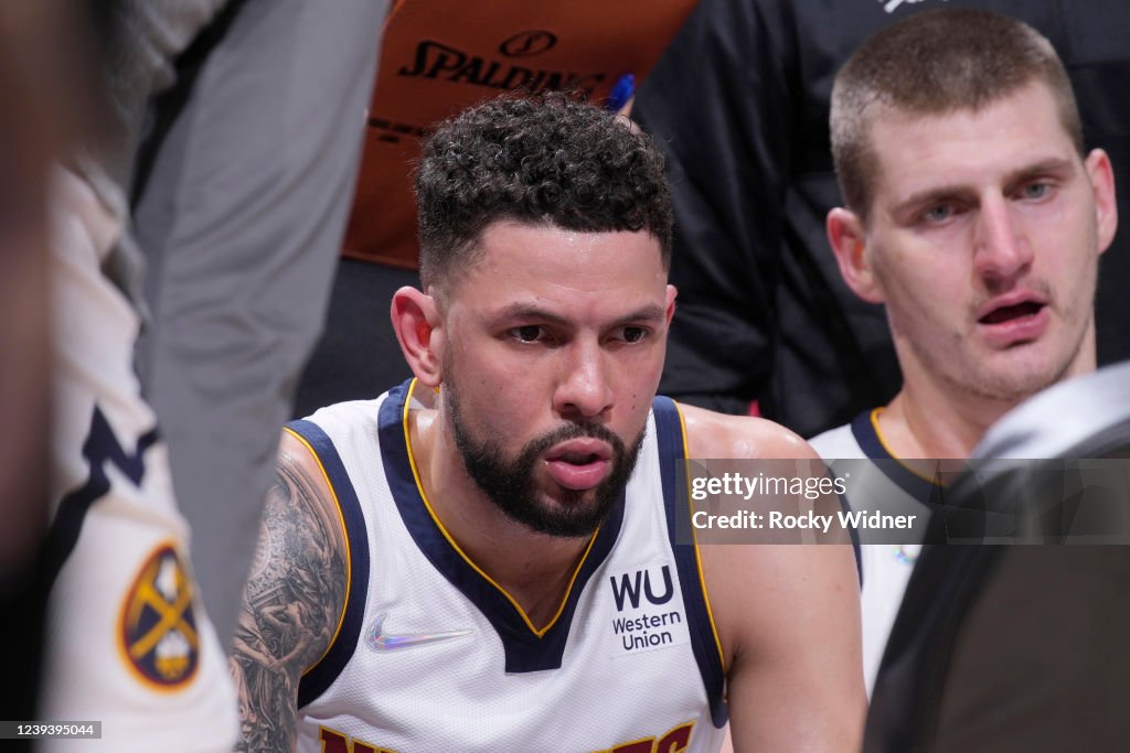 Austin Rivers Denver Austin Rivers of the Denver Nuggets looks on during the game against ...