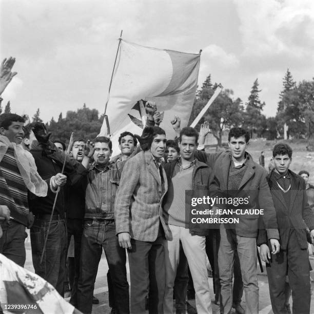 Thousands of Algerian Muslims demonstrate on December 11, 1960 in the European quarters of Algiers shouting "Yahia de Gaulle", "Algerian Algeria" and...