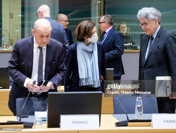 French Minister of Europe and Foreign Affairs Jean-Yves Le Drian talks with the French Minister of the Armed Forces Florence Parly and the EU...