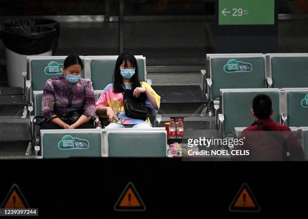 Relatives of passengers on China Eastern flight MU5375 are seen at the holding area, after the plane failed to arrive at Guangzhou Baiyun...