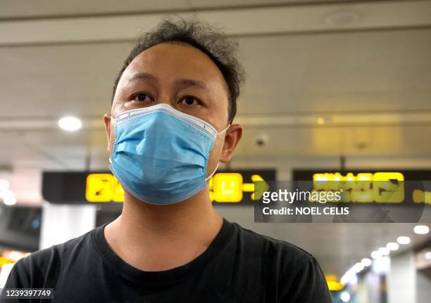Hey Ye, a colleague of one of the passengers on China Eastern flight MU5375, talks to journalists, after the plane failed to arrive at Guangzhou...