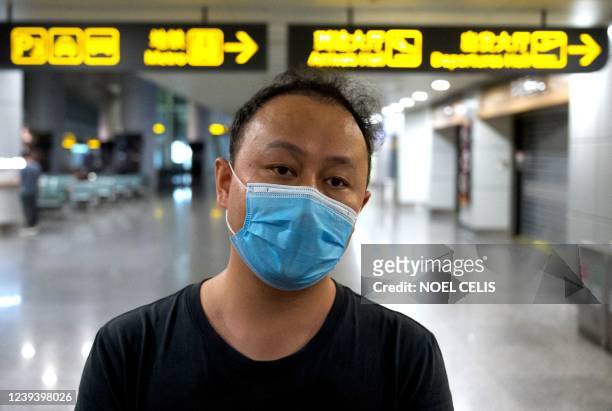 Hey Ye, a colleague of one of the passengers on China Eastern flight MU5375, talks to journalists, after the plane failed to arrive at Guangzhou...