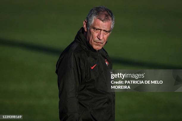 Portugal's head coach Fernando Santos looks on during a training session at the Cidade do Futebol training camp in Oeiras, outside Lisbon, on March...
