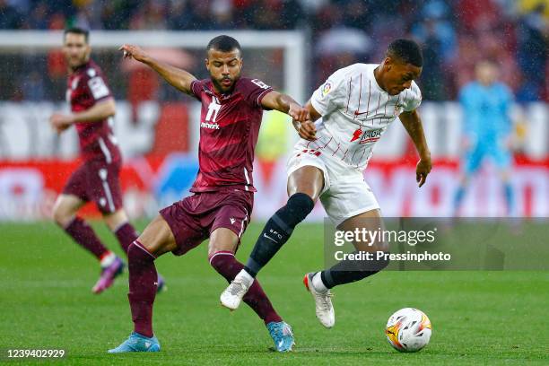 Rafael Alcantara Rafinha of Real Sociedad and Anthony Martial of Sevilla FC during the La Liga match between Sevilla FC v Real Sociedad played at...