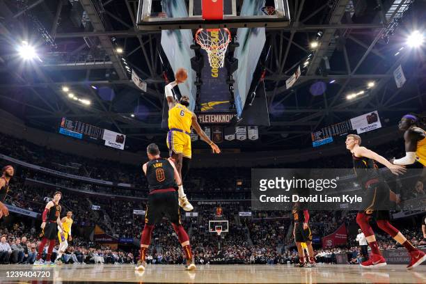 LeBron James of the Los Angeles Lakers dunks the ball during the game against the Cleveland Cavaliers on March 21, 2022 at Rocket Mortgage FieldHouse...