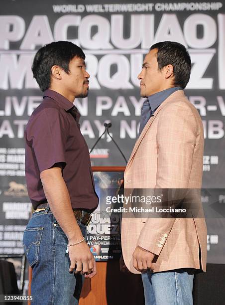 Professional Boxers Manny Pacquiao and Juan Manuel Marquez attend the press conference for their World Welterweight Championship Fight at The...
