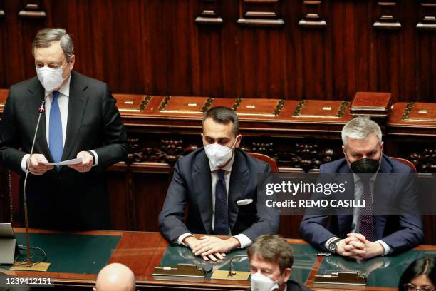 Italian Prime Minister Mario Draghi speaks next to Foreign Minister Luigi Di Maio and Defence Minister Lorenzo Guerini after Ukrainian President...