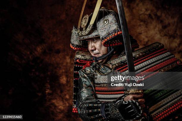 a warrior who has perfect defense with a samurai armor for battle - samoerai stockfoto's en -beelden