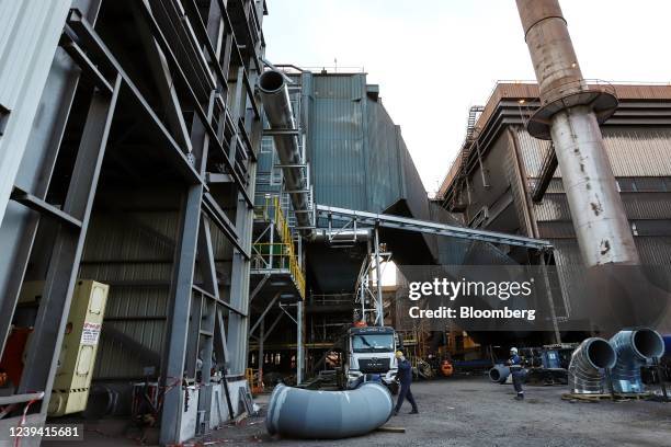 Workers at the biocoal loading station at the ArcelorMittal SA Ghent steel plant in Ghent, Belgium, on Thursday, March 17, 2022. While the European...