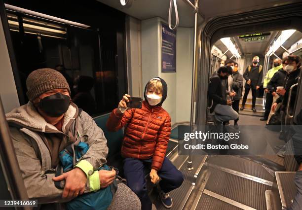 Somerville People took photos of the first run on the Green Line extension from the new Union Square Station in Somerville, MA on March 21, 2022. The...