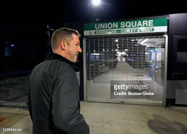 Somerville MBTA General manager Steve Poftak waits by the entrance of Union Square Station for the first run on the Green Line extension from Union...