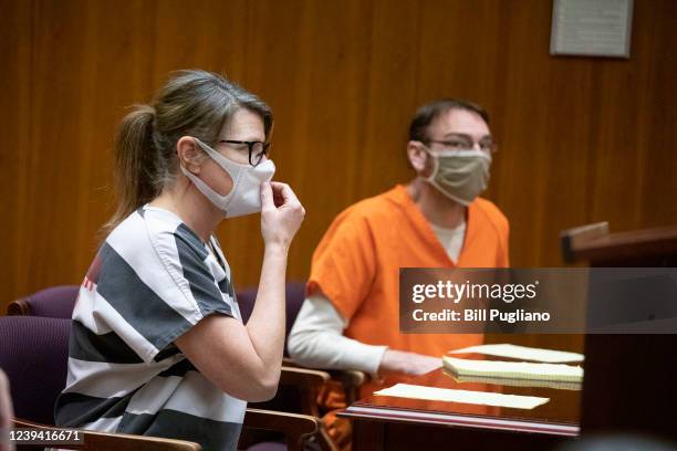 Jennifer Crumbley and her husband James Crumbley, parents of the alleged teen Oxford High School shooter Ethan Crumbley who is charged with killing...