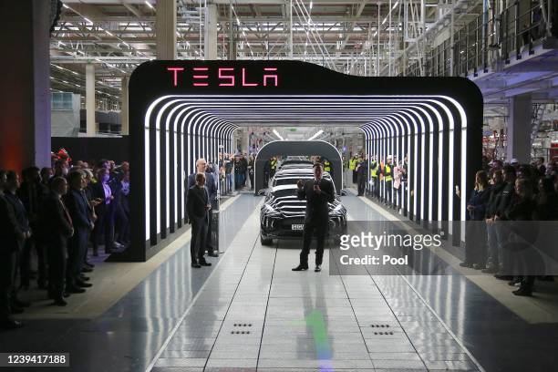 Tesla CEO Elon Musk speaks during the official opening of the new Tesla electric car manufacturing plant on March 22, 2022 near Gruenheide, Germany....