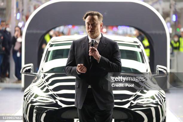 Tesla CEO Elon Musk speaks during the official opening of the new Tesla electric car manufacturing plant on March 22, 2022 near Gruenheide, Germany....