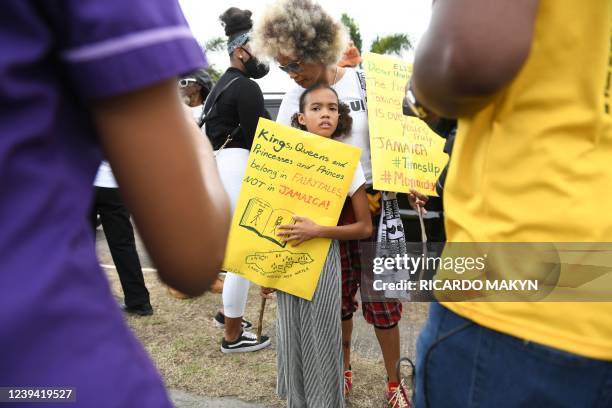 People calling for slavery reparations, protest outside the entrance of the British High Commission during the visit of the Duke and Duchess of...