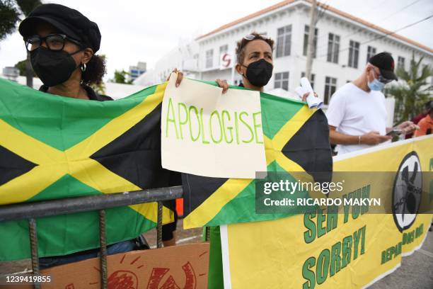People calling for slavery reparations, protest outside the entrance of the British High Commission during the visit of the Duke and Duchess of...