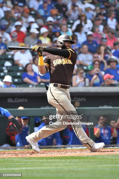 Nomar Mazara of the San Diego Padres bats during the second inning of an MLB spring training game against the Chicago Cubs at Sloan Park on March 19,...