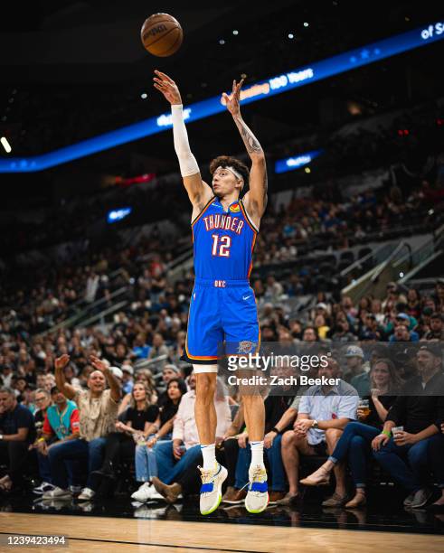 Lindy Waters III of the Oklahoma City Thunder shoots a three point basket during the game against the San Antonio Spurs on March 16, 2022 at the AT&T...