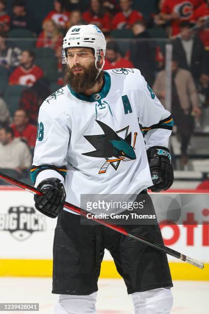 Brent Burns of the San Jose Sharks prepares to face off against the Calgary Flames at Scotiabank Saddledome on March 22, 2022 in Calgary, Alberta,...