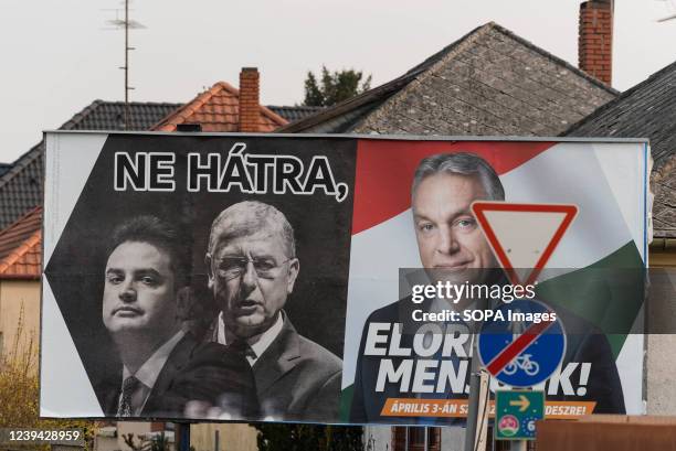 The election billboard for the Fidesz party displays the faces of the leader of opposition Peter Marki-Zay, former prime minister Ferenc Gyurcsany,...