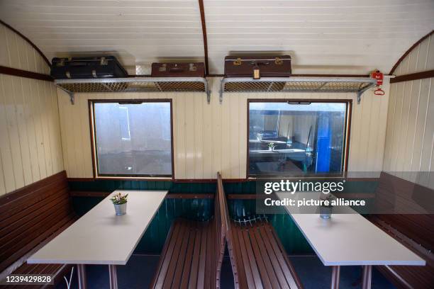 March 2022, Saxony-Anhalt, Benneckenstein: Seating in a wagon converted into a "Mitropa wagon" from the East German Vehicle and Industry Museum in...