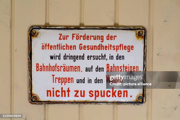 March 2022, Saxony-Anhalt, Benneckenstein: A historical sign in a wagon from the East German Vehicle and Industry Museum in Benneckenstein points out...