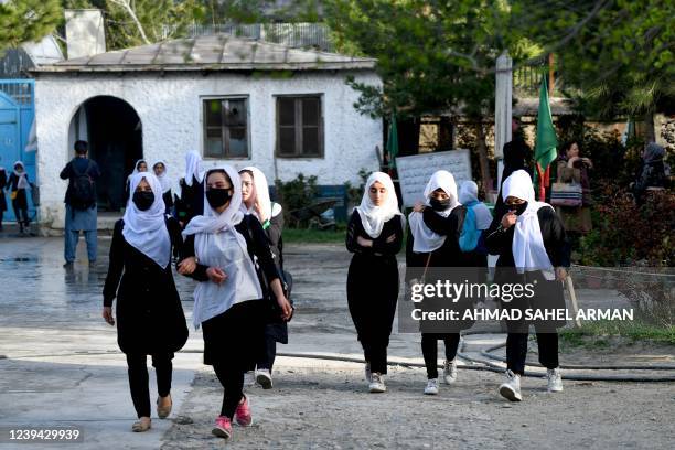 Updated information - Girls arrive at their school in Kabul on March 23, 2022. - The Taliban ordered girls' secondary schools in Afghanistan to shut...