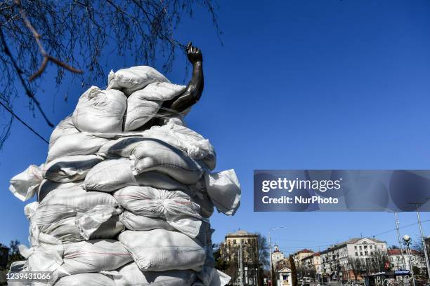 Sandbags piled by local volunteers, historians and museum employees seal the monument to Ukrainian weightlifter, Olympic gold medallist Leonid...