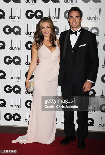 Model Kelly Brook and boyfriend Thom Evans attend the GQ Men Of The Year Awards at The Royal Opera House on September 6, 2011 in London, England.