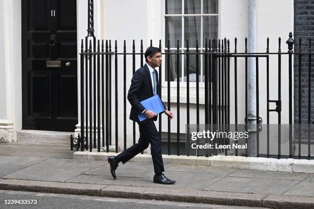 Chancellor of the Exchequer Rishi Sunak leaves 11 Downing Street for the House of Commons to deliver his Spring Statement on March 23, 2022 in...