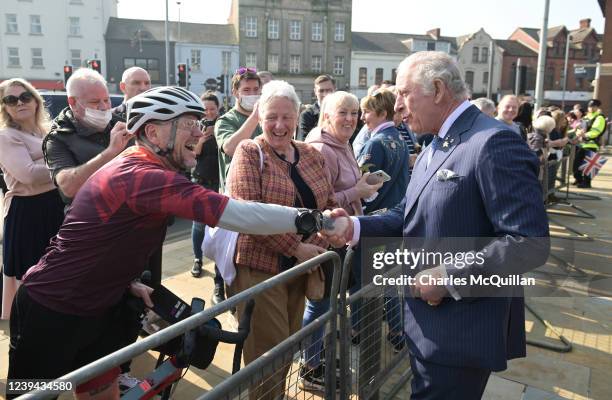 Prince Charles, Prince of Wales meets well-wishers at CS Lewis Square on day 2 of their visit to Northern Ireland on March 23, 2022 in in Belfast,...