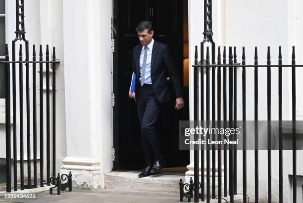 Chancellor of the Exchequer Rishi Sunak leaves 11 Downing Street for the House of Commons to deliver his Spring Statement on March 23, 2022 in...