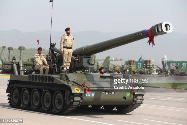 Soldiers are seen on a tank during a military parade held on the occasion of the Pakistan's National Day in the capital Islamabad, Pakistan on March...