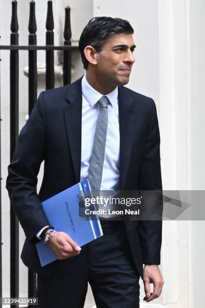 Chancellor of the Exchequer Rishi Sunak leaves 11 Downing Street for the House of Commons to deliver his Spring Statement on March 23, 2022 in...