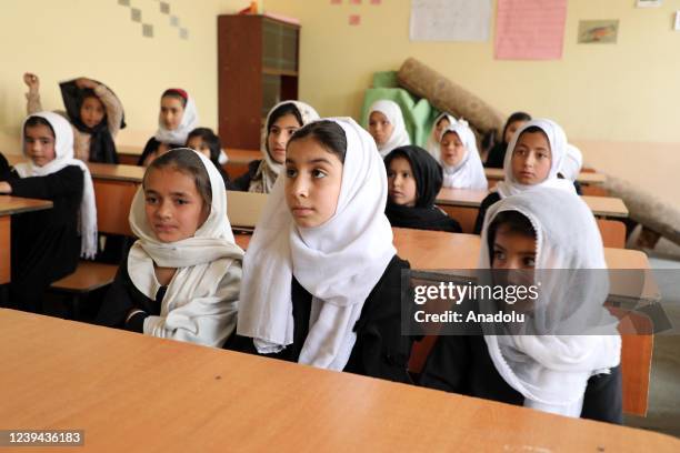 Girl students are seen in a class in Kabul, Afghanistan on March 22, 2022. Months later, all schools for boys and primary schools for girls opened in...