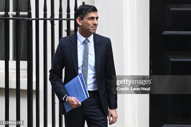 Chancellor of the Exchequer Rishi Sunak leaves 11 Downing Street for the House of Commons to deliver his Spring Statement on March 23, 2022 in...