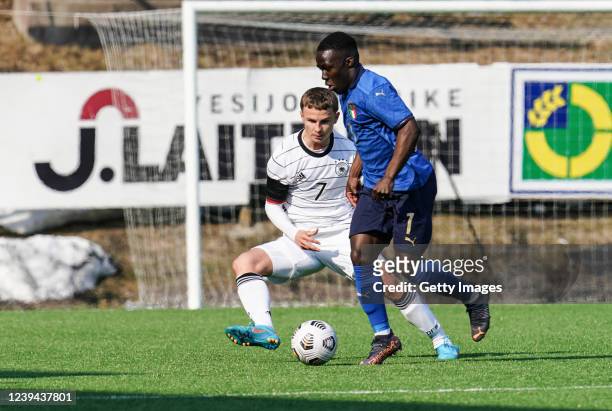 Niklas Jessen of Germany of Degnand Wilfried Gnoto of Italy during the UEFA Under19 European Championship Qualifier match between Germany U19 and...