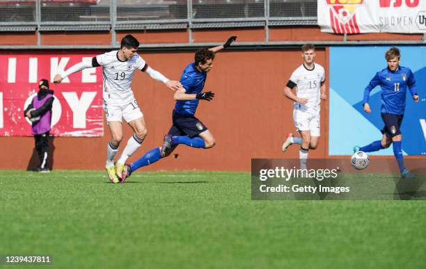 Igor Matanovic of Germany steps on the heels of Giorgio Scalvini of Italy during the UEFA Under19 European Championship Qualifier match between...